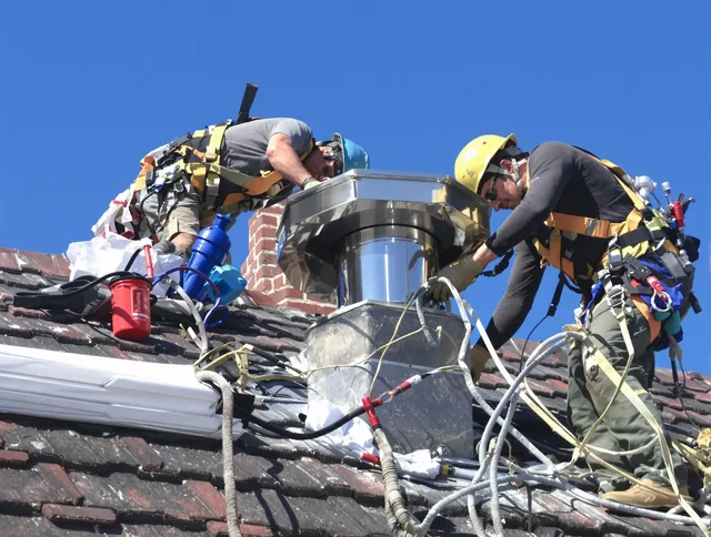 Protective chimney cap installed by Valley Falls Chimney Sweep in Valley Falls, RI