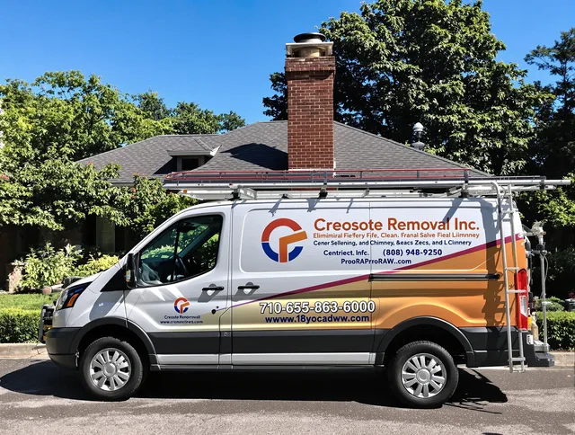 Valley Falls Chimney Sweep technician removing creosote safely in Valley Falls, RI